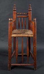wooden high chair used by the Mather family
